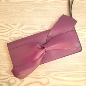 Bowtie vegan leather clutch